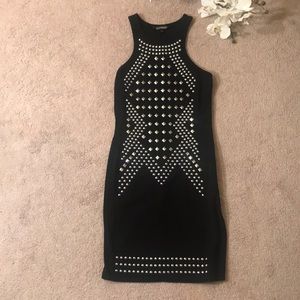 Black dress with metal accents